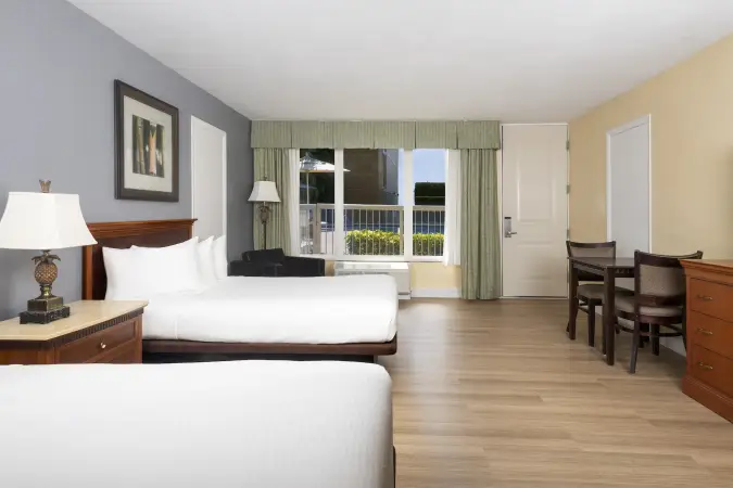 Image for room KPVS - obivero_kpvs_2queenstudiopoolview_bedroom.webp