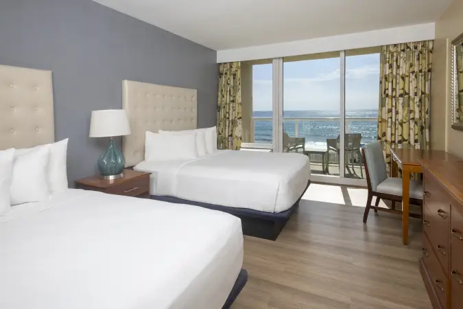 Image for room QOFS - obivero_qofs_2queensuiteoceanfront_bedroom.webp